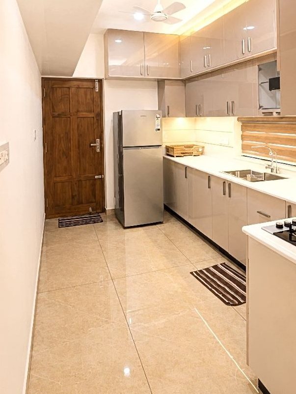 Villa kitchen with refrigerator and full appliance package